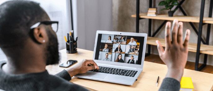 A remote worker involved in a group video call online
