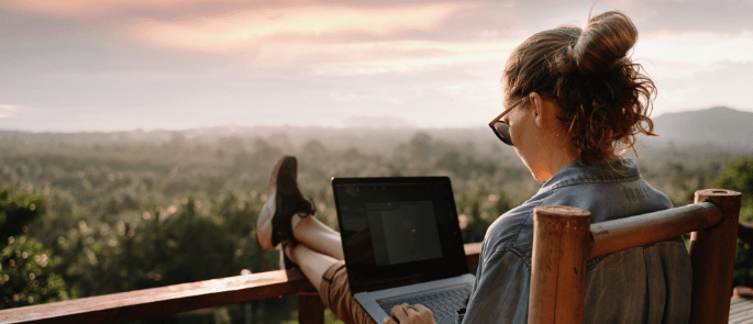Female working remotely on her laptop