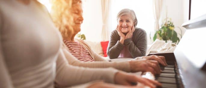 Music therapy session at the piano with elderly client