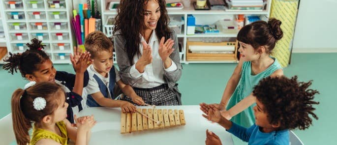 Group music therapy session with young children