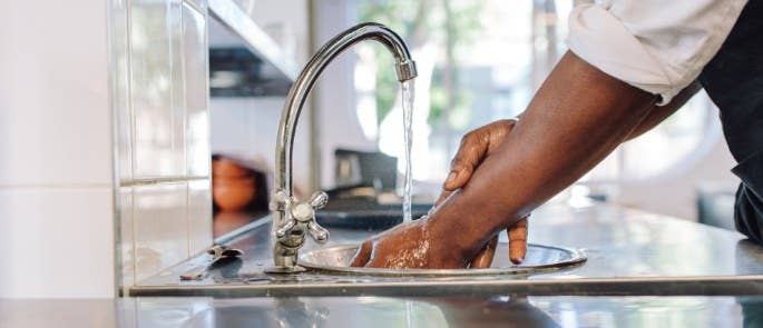 Washing hands in a commercial kitchen