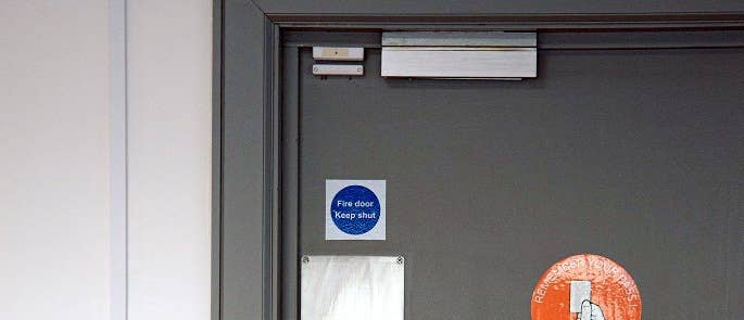 Fire door and signage keep shut sign