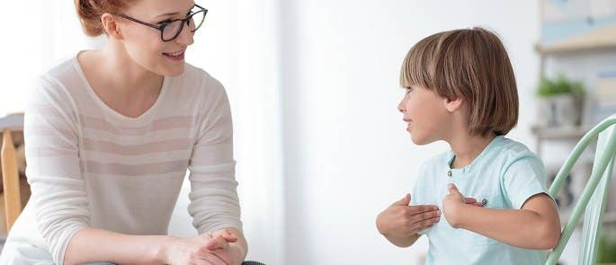 An adult talking with a child