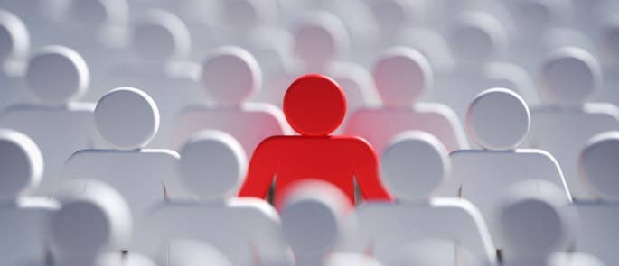 Abstract image of person standing out in a crowd