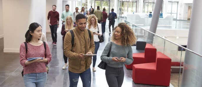 Students walking through a college building