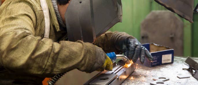 Worker carrying out welding hot work