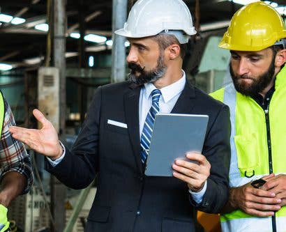 health-and-safety-officer-talking-to-workers