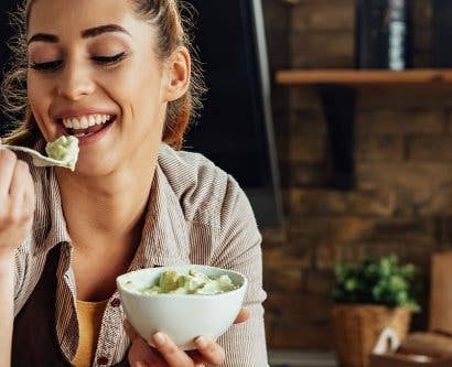 an-individual-tasting-food