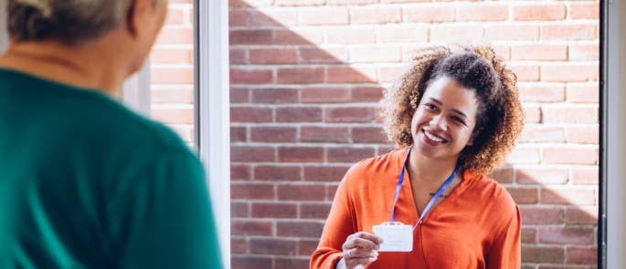 Care worker visiting an individual's home