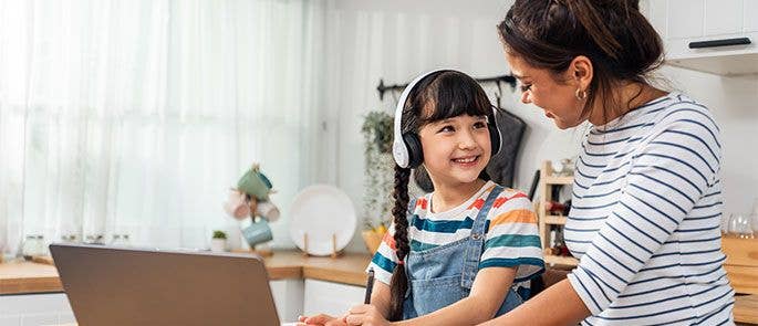 Parent and child talking about online safety