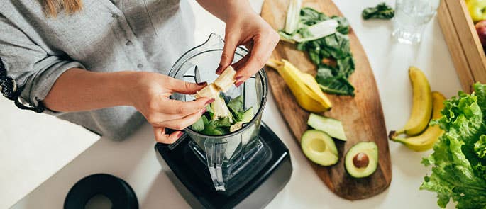 consumer using a clean, safe blender