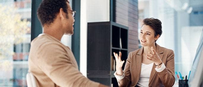 Employers having a discussion in the workplace