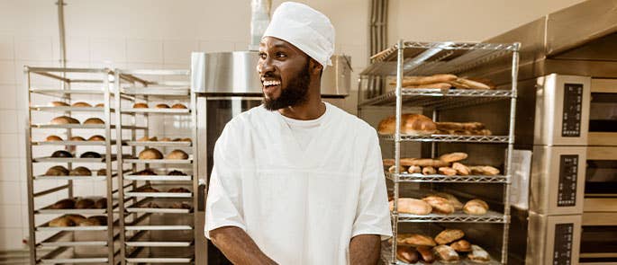 Baker smiling in workplace