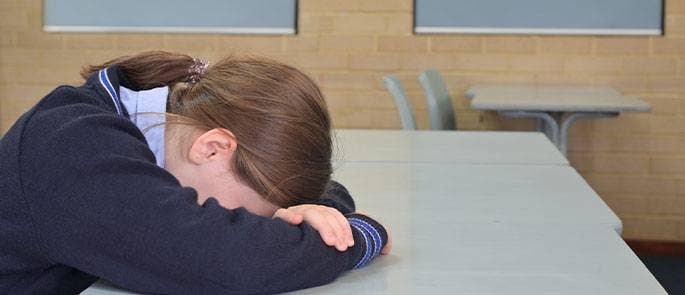 Young girl feeling isolated at school