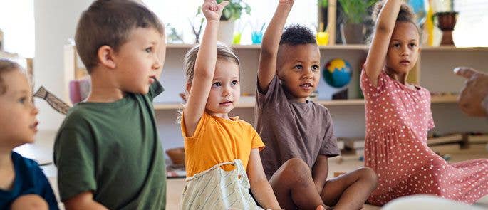 A group of young children in the classroom