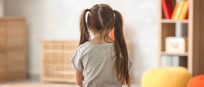 Child sitting alone