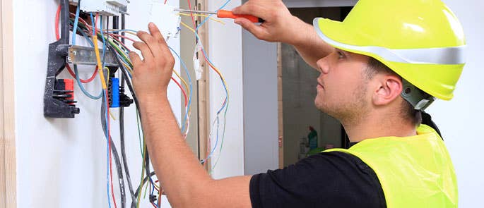 Electrician working with wires