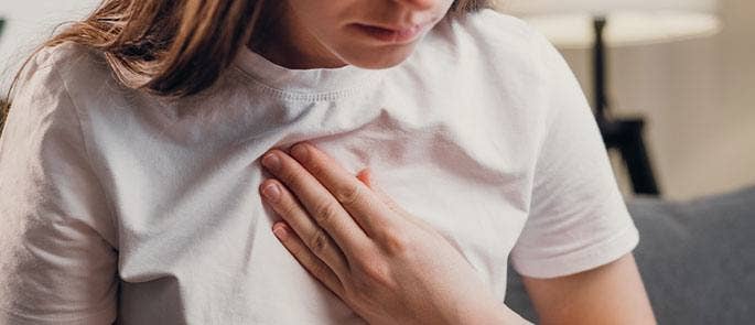 Young girl struggling with an asthma attack