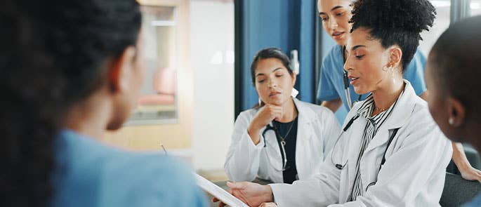 healthcare professionals gathered to make a decision together