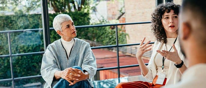 Employees taking part in a discussion at work