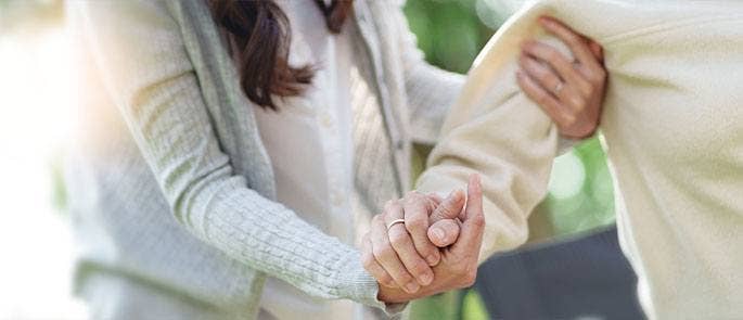 Care worker helping a patient
