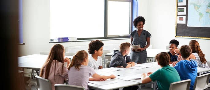 teacher with students in classroom
