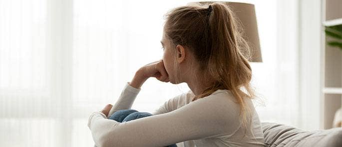 A young girl feeling worried
