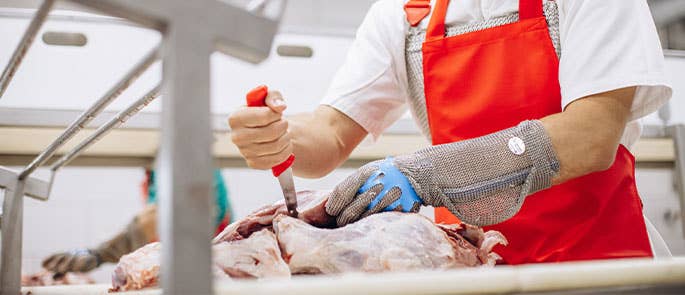 butcher chopping meat 