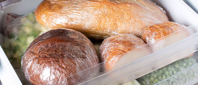 Bread being stored in a freezer drawer