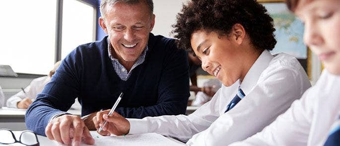 Teacher and pupil in the classroom