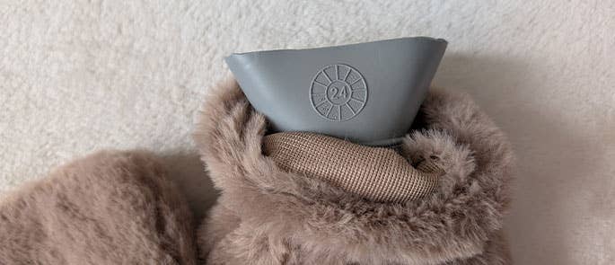 Photo showing the daisy wheel on a hot water bottle