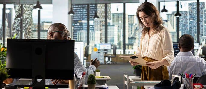 Employees talking in the office