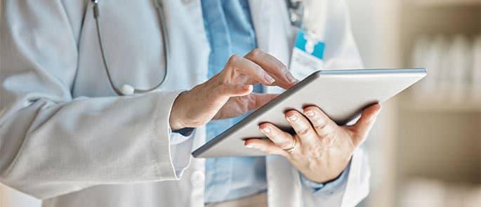 health and social care worker on ipad or tablet