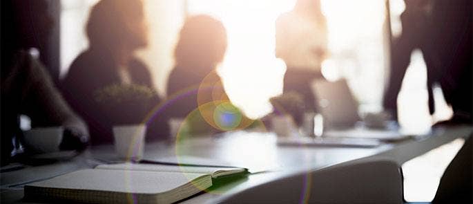 Employees having a discussion about security