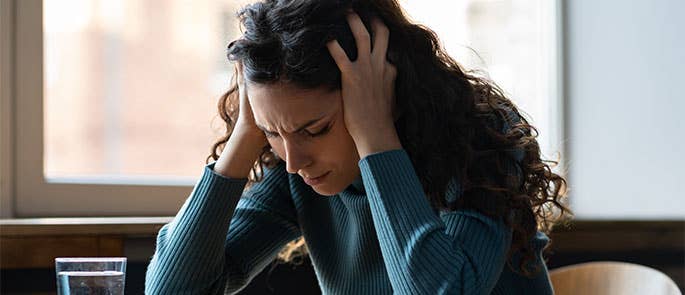 Woman visibly stressed