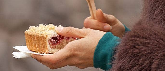 Woman eating a sweet treat