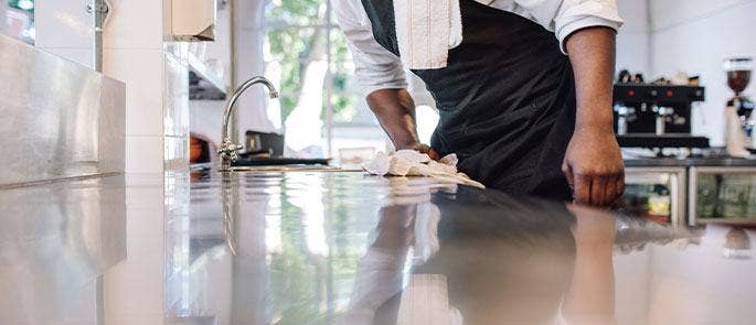 Chef cleaning the kitchen