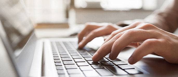 Someone using a laptop