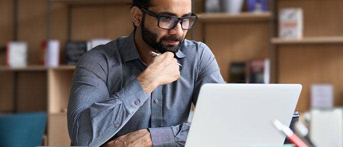 Male working on a laptop