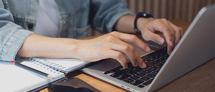 Someone using a laptop