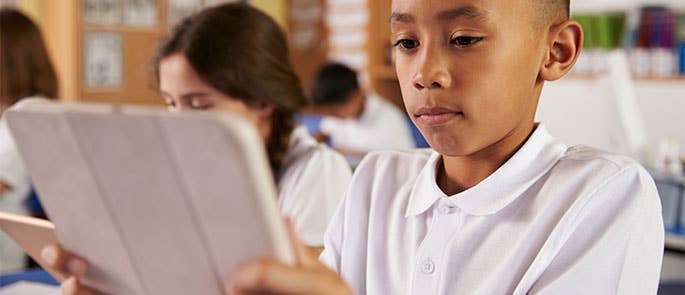 Student with ipad in classroom