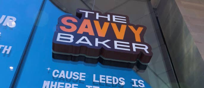 The Savvy Baker signage on building in Leeds