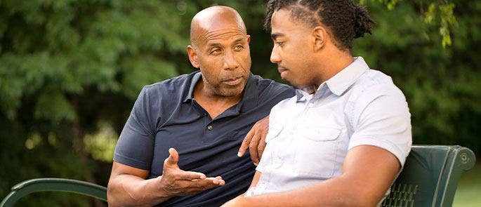Father and son talking