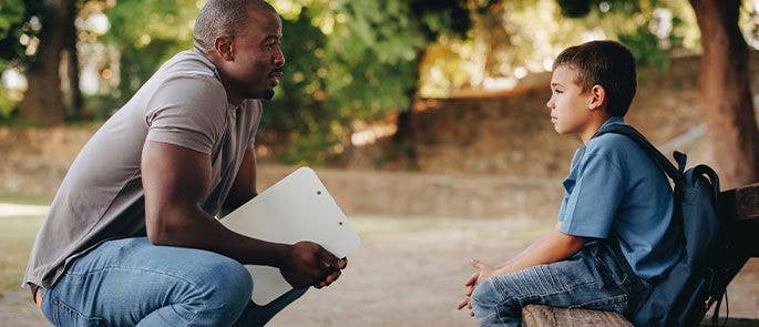 Adult talking to a child