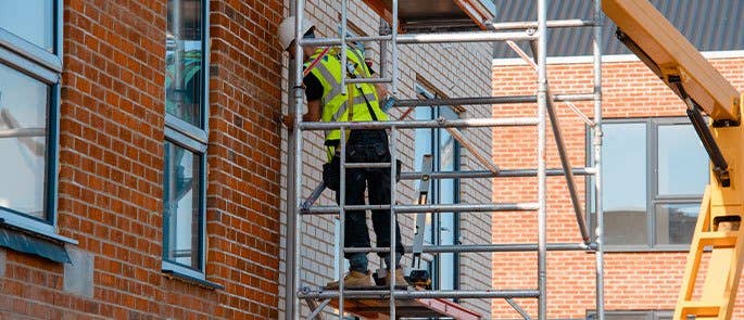 Construction worker on scaffolding