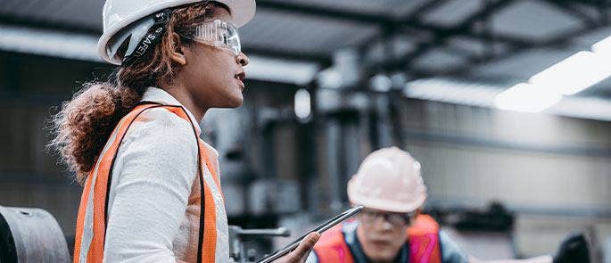 Employee managing workers