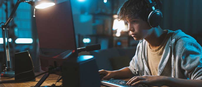 young person playing computer games